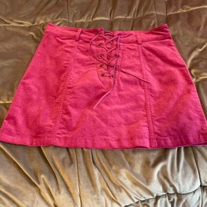 Pink skirt , zip back and laced in the front, size M,EUC, forever 21